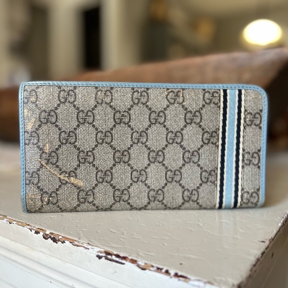 Gucci Handbags - Gucci zip around canvas wallet NICE